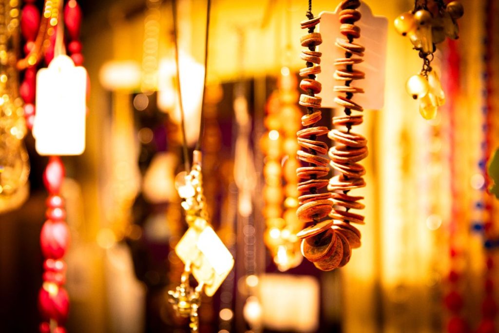 Beaded necklaces on display at the Skanda Vale Hospice Charity Shop.