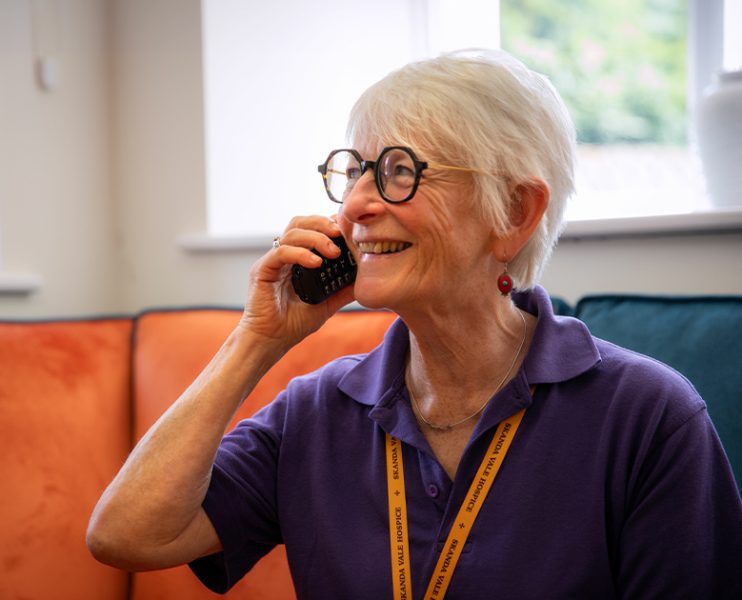 Volunteer using a phone