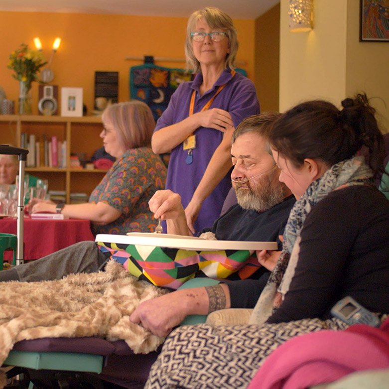 Photo of nurse overseeing residents